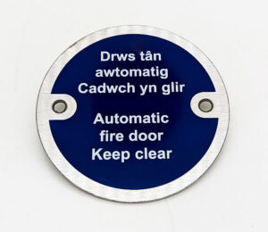 Auto Fire Door Keep Clear Welsh/English 75mm Dia (Per EACH)